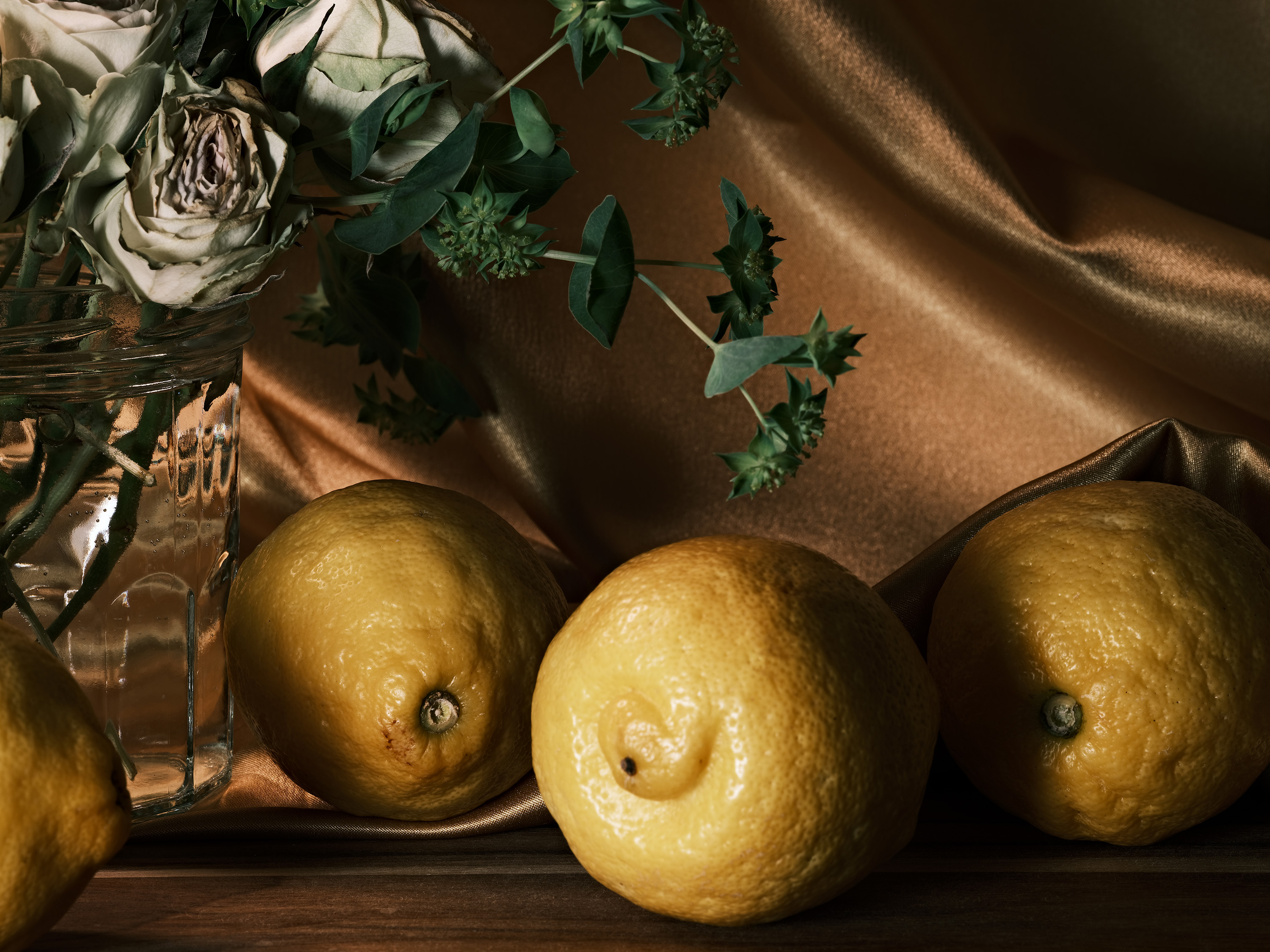 Still life photography using flowers and lemons
